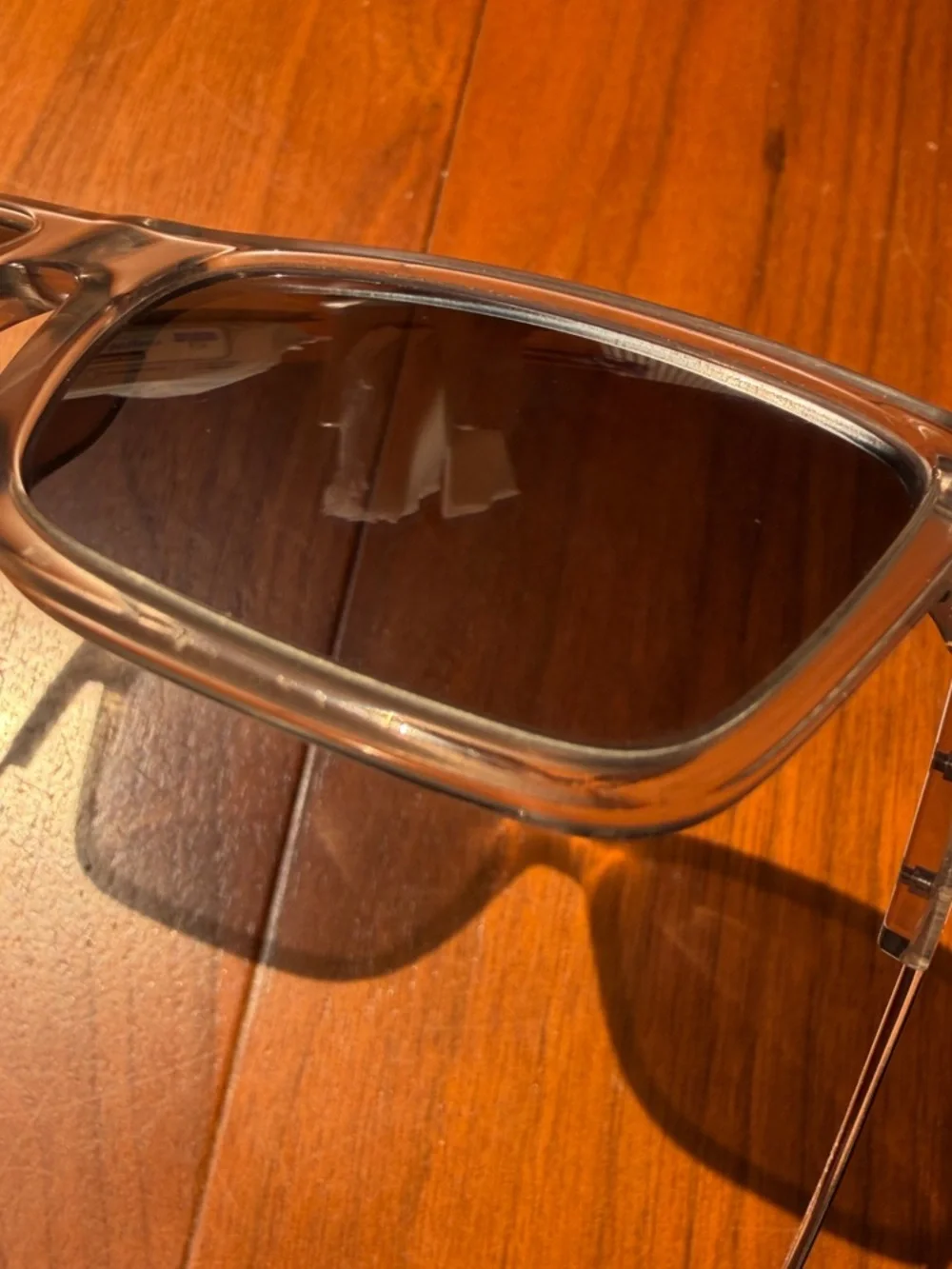 Prada Men’s Clear Frame Sunglasses with Dark Blue Lenses